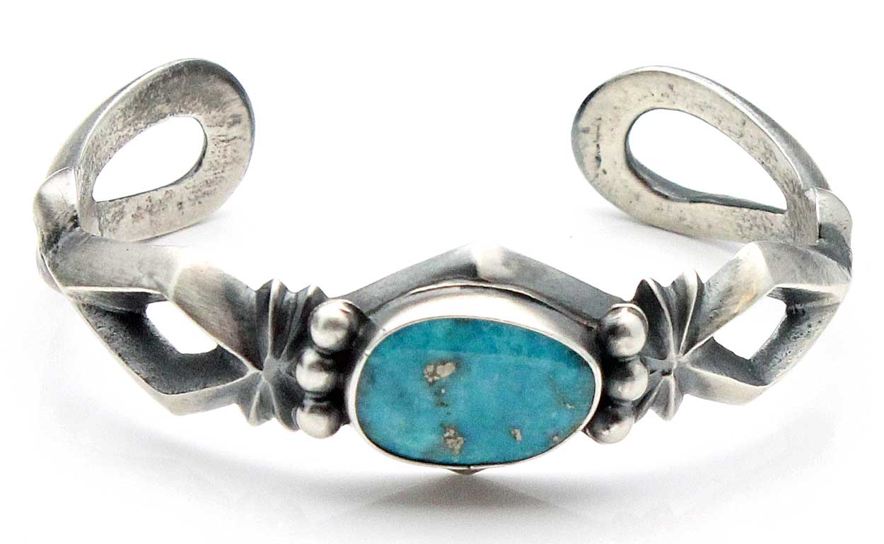 Navajo Silver Cast Bracelet with Turquoise by Harrison Bitsui