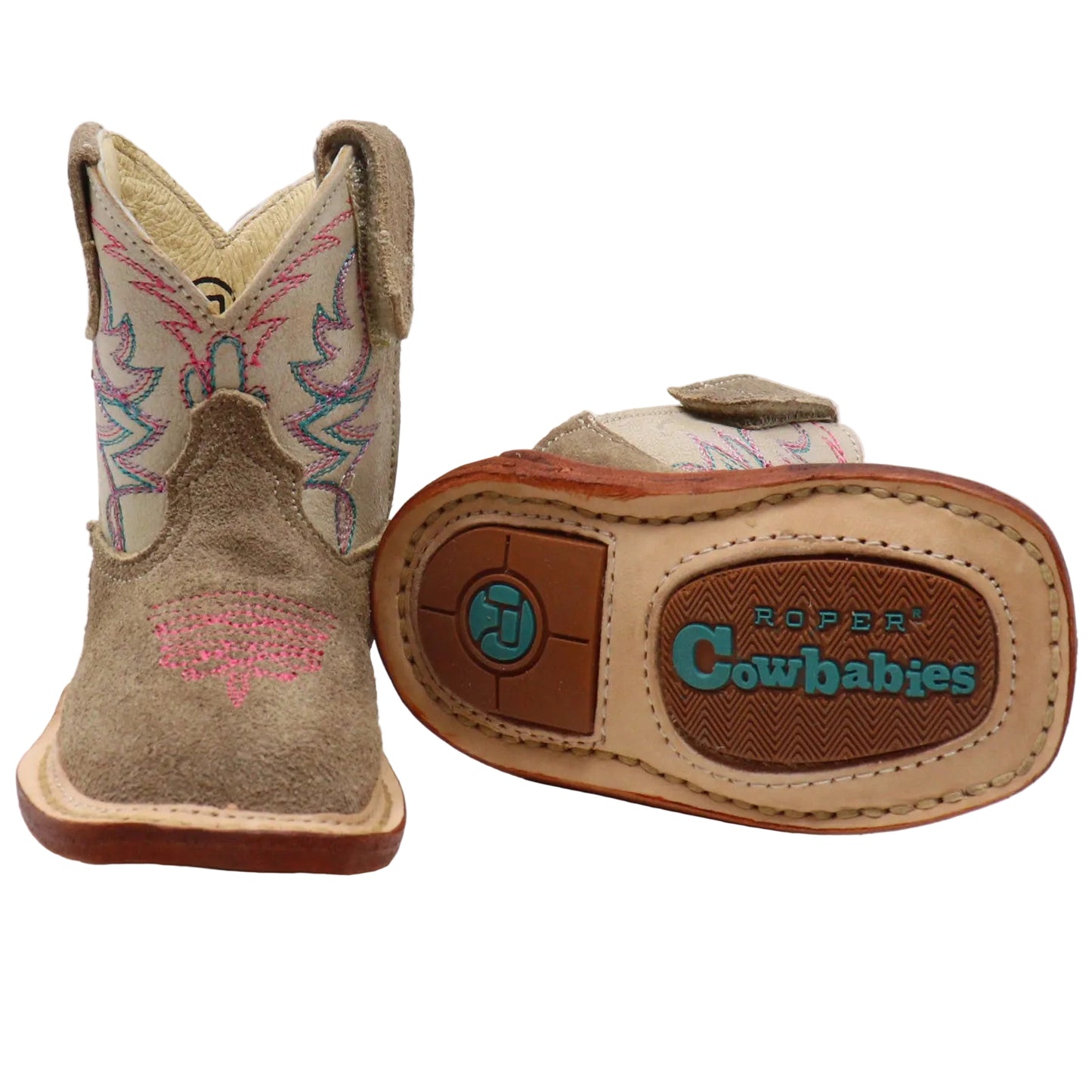 A pair of toddler western cowboy boots in tan suede, showing one boot from the side with embroidered details, and the other from the sole showing the 'Roper Cowbabies' branding.