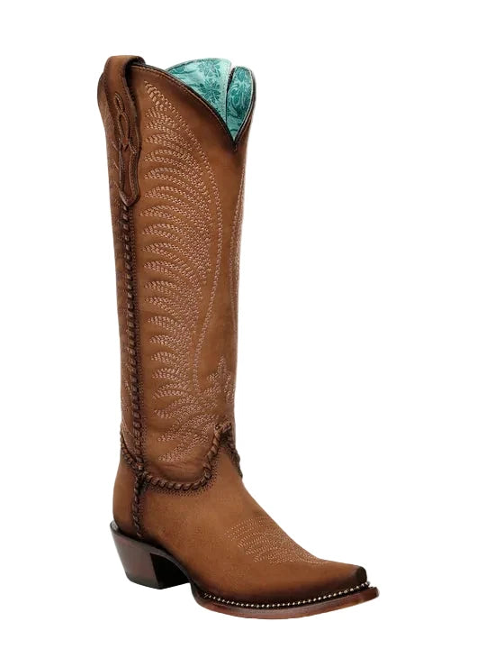 Brown cowboy boot with turquoise insole on a white background