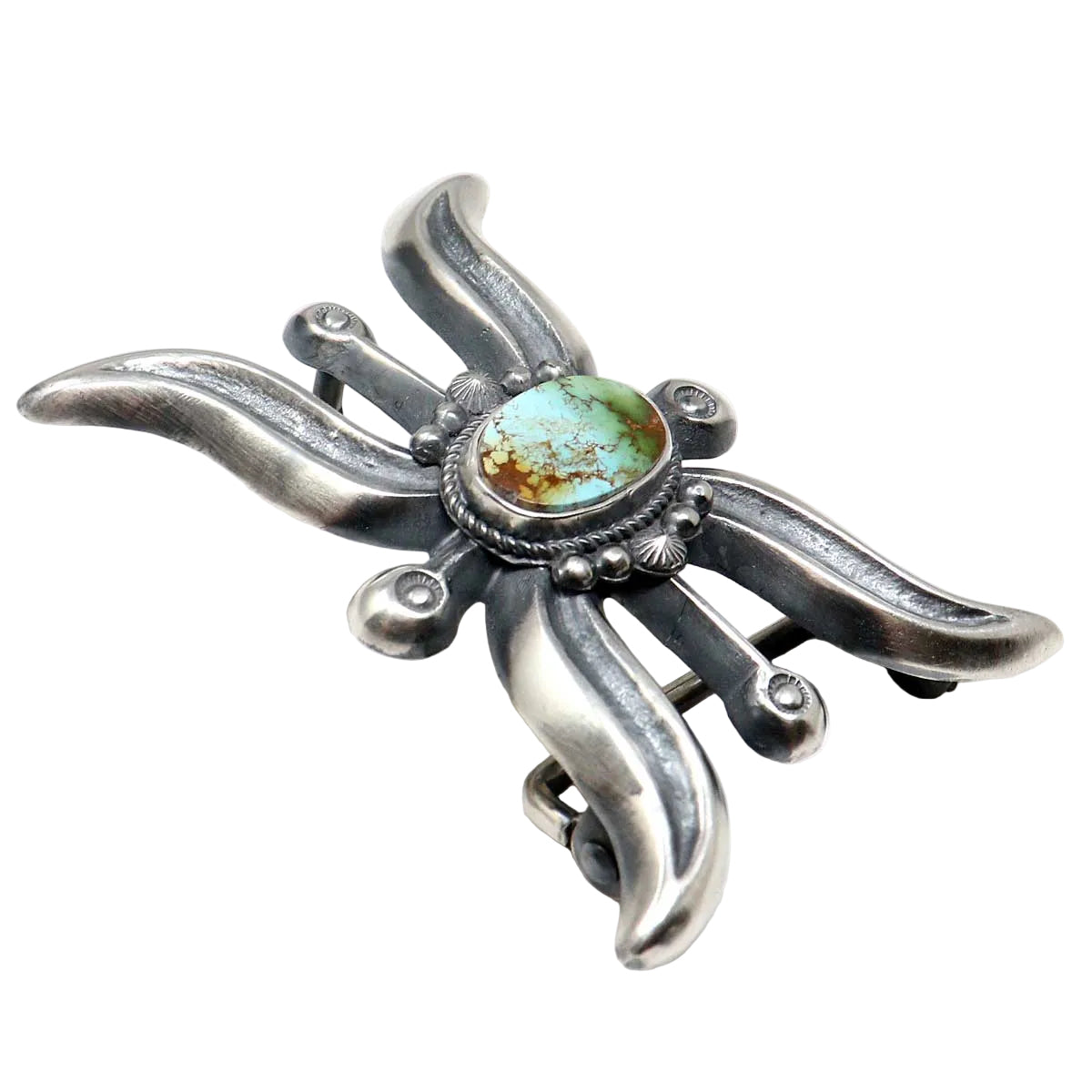 Silver buckle with Natural Pilot Mountain turquoise stone on a white background