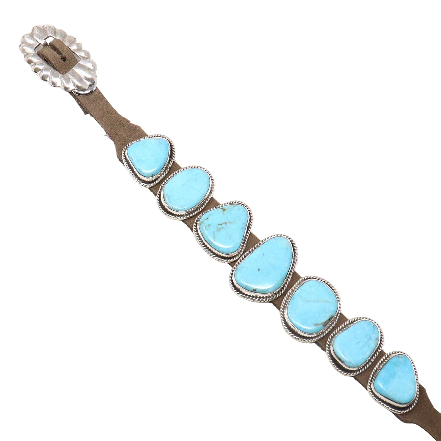 Bracelet with turquoise stones and brown leather strap on a white background