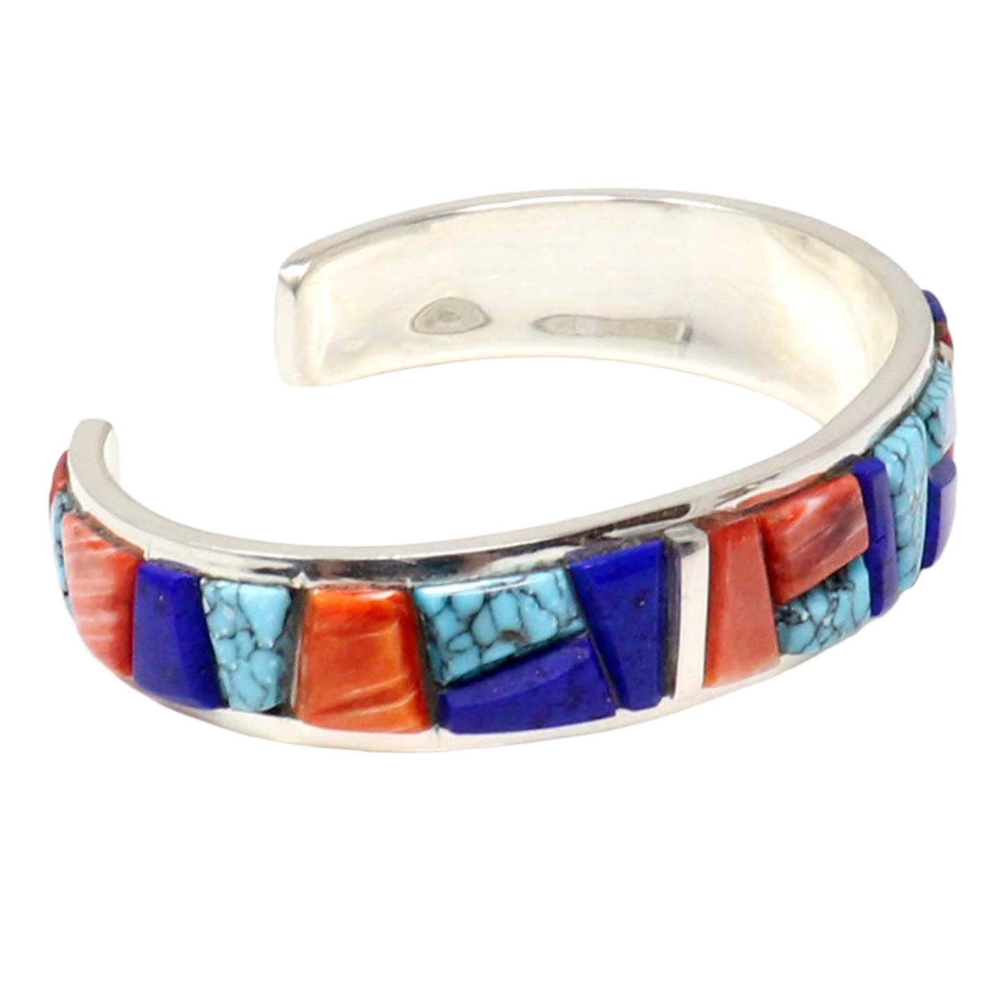 Silver bracelet with colorful stone inlay on a white background