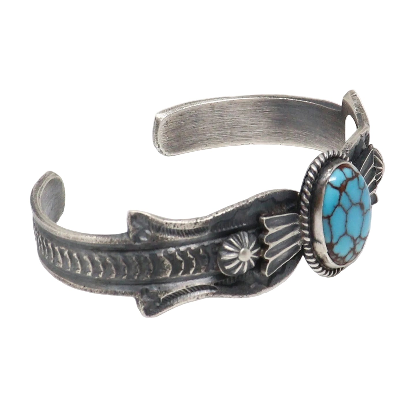 A sterling silver cuff bracelet featuring a turquoise stone inlay, photographed on a clean white background.