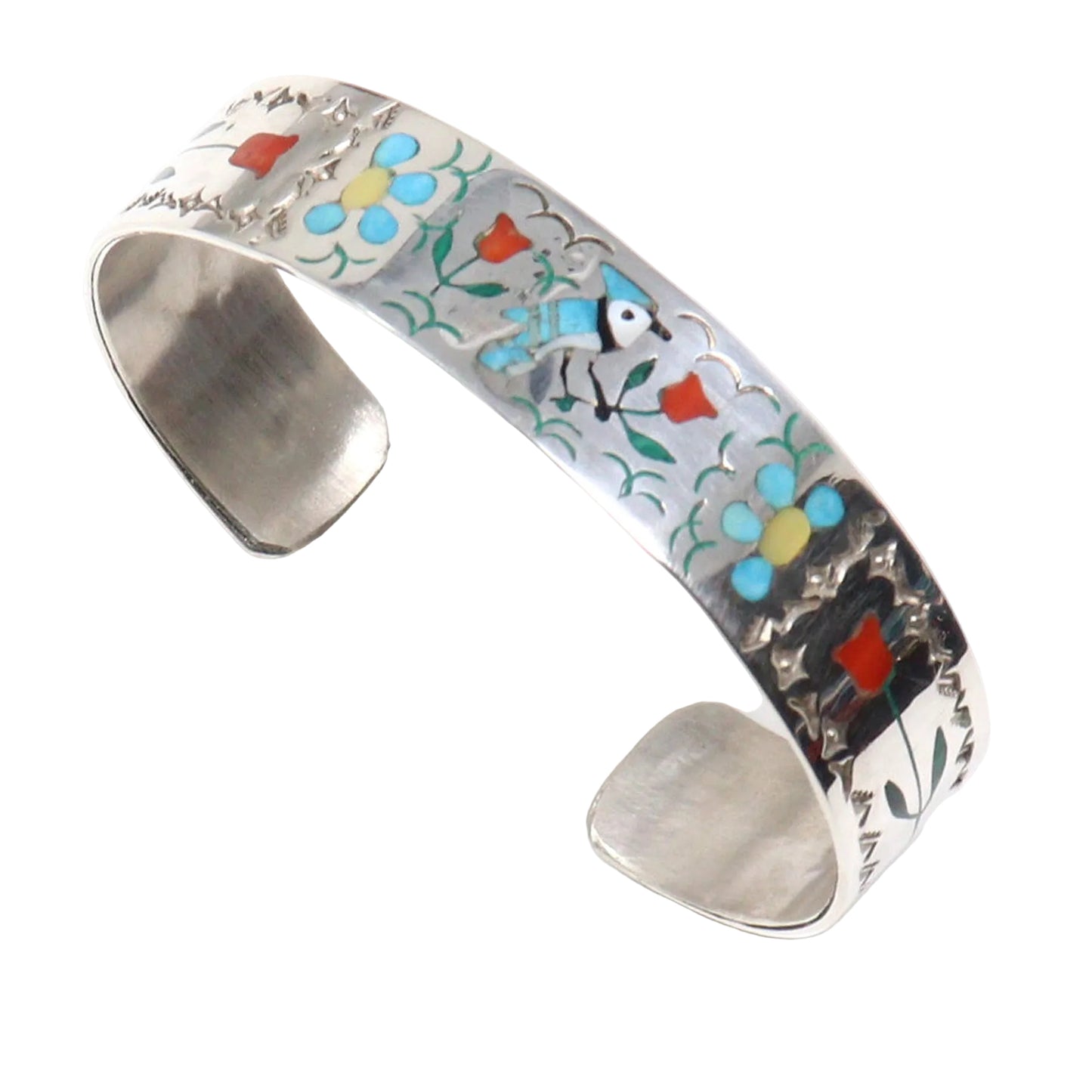 A sterling silver cuff bracelet featuring colorful inlay details of flowers, leaves, and a bird, photographed on a clean white background.