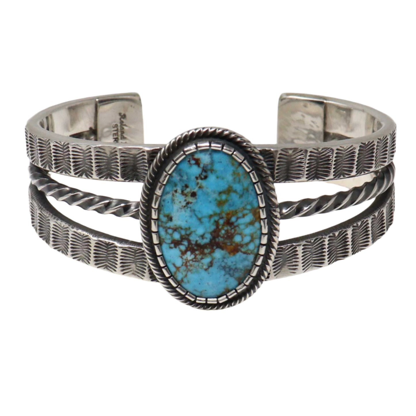 Silver bracelet with turquoise stone on a white background