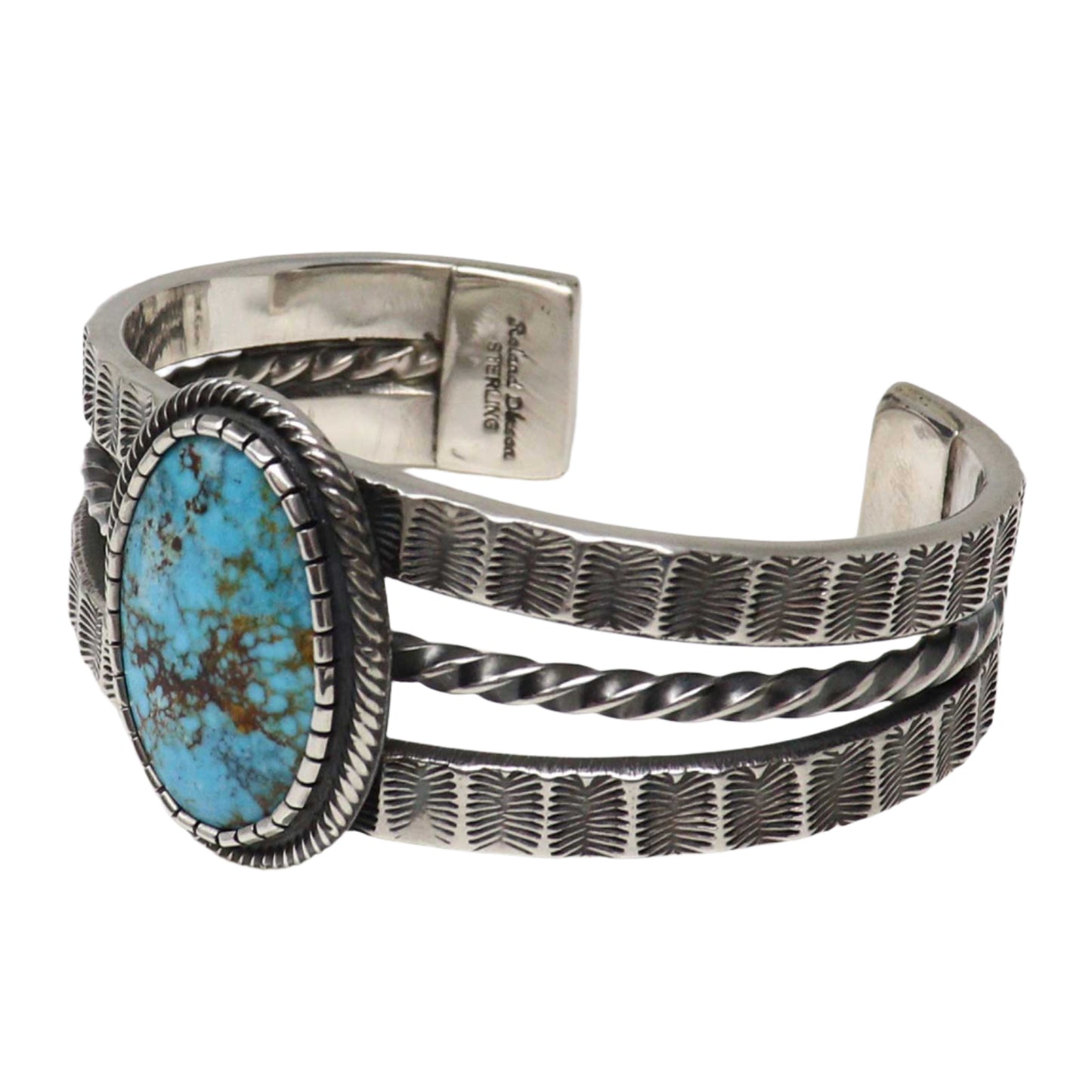 Silver bracelet with turquoise stone on a white background