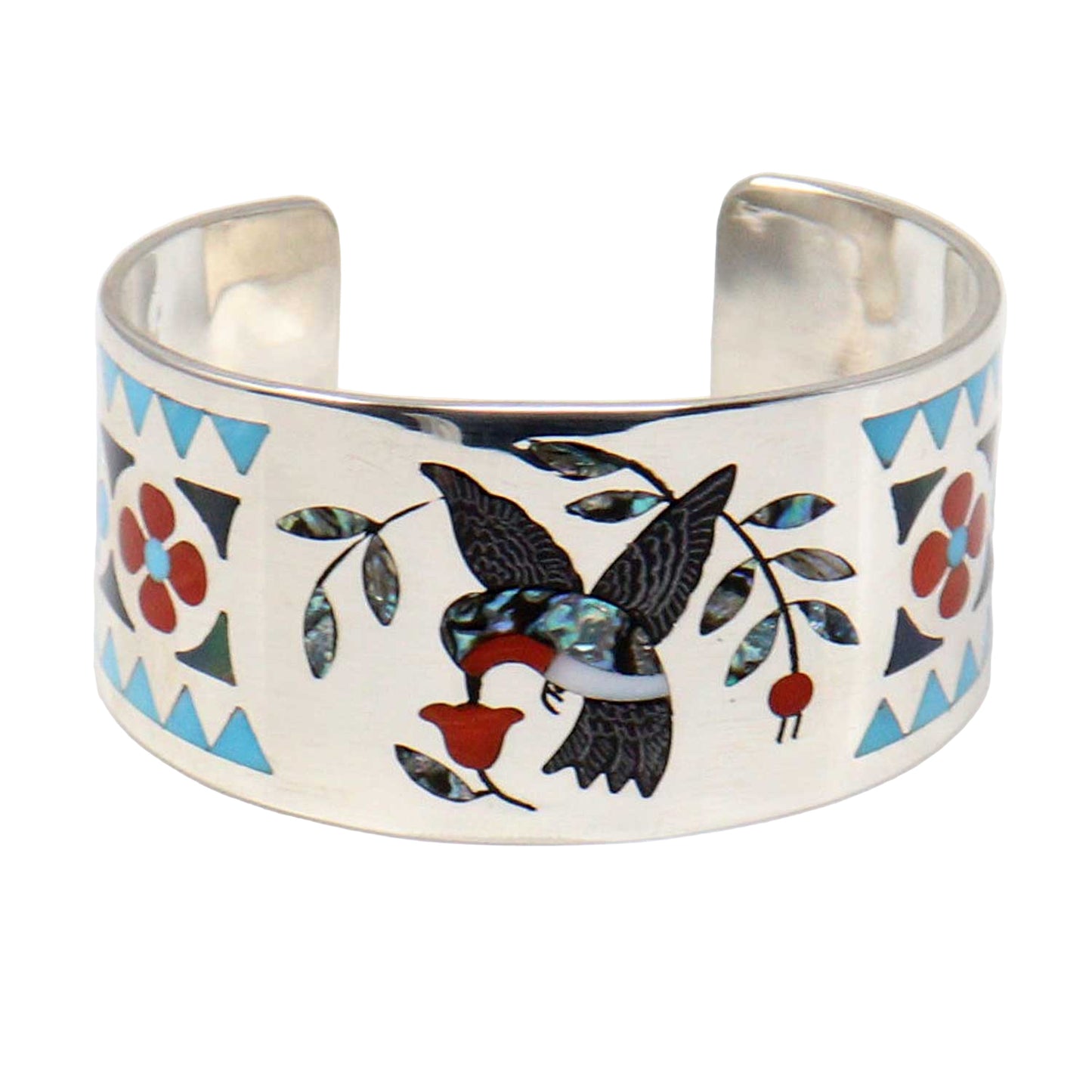 Silver cuff bracelet with a colorful inlay design featuring a bird and floral patterns on a white background.