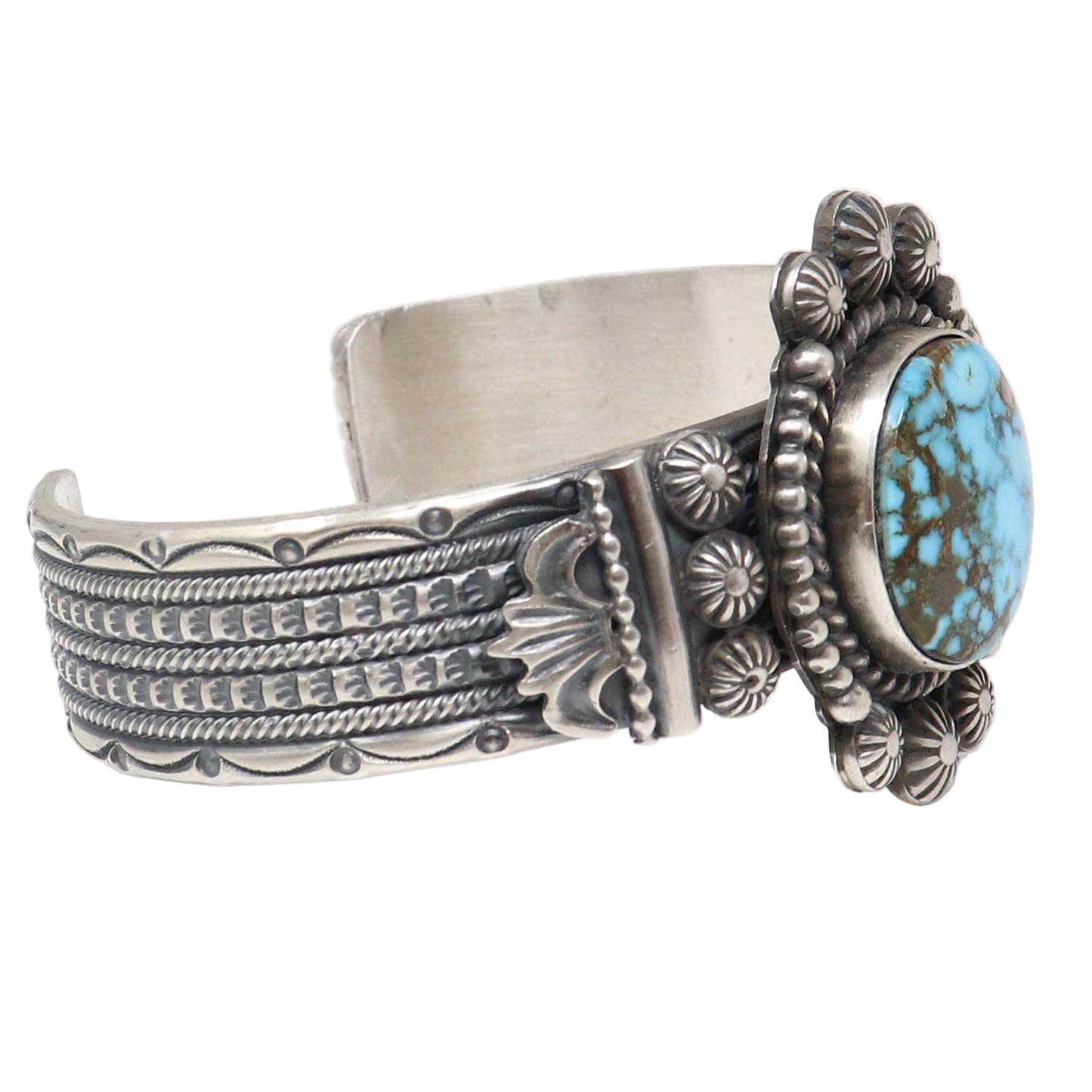 Silver bracelet with turquoise stone on a white background