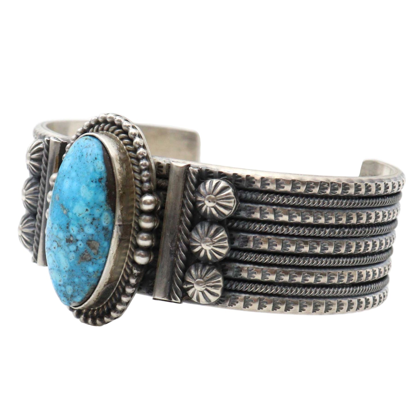 Silver bracelet with turquoise stone on a white background