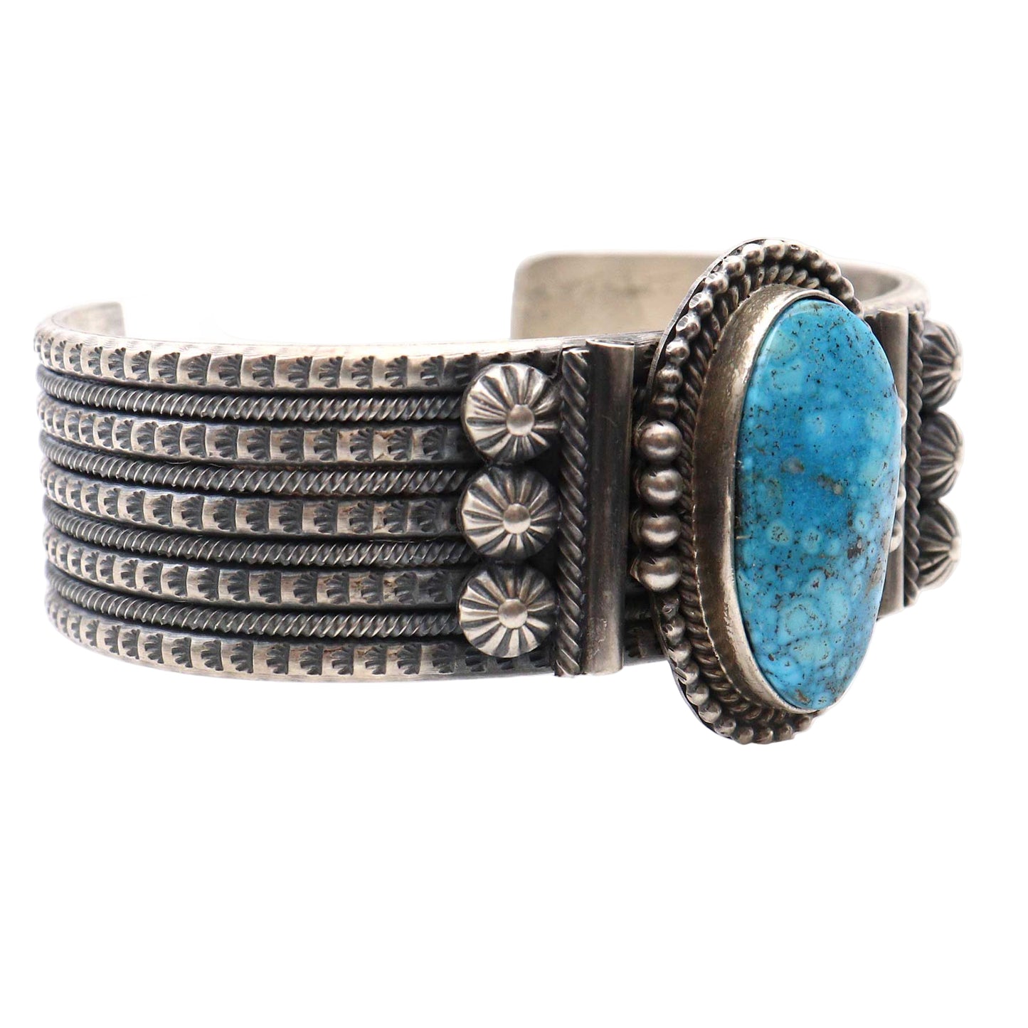 Silver bracelet with turquoise stone on a white background