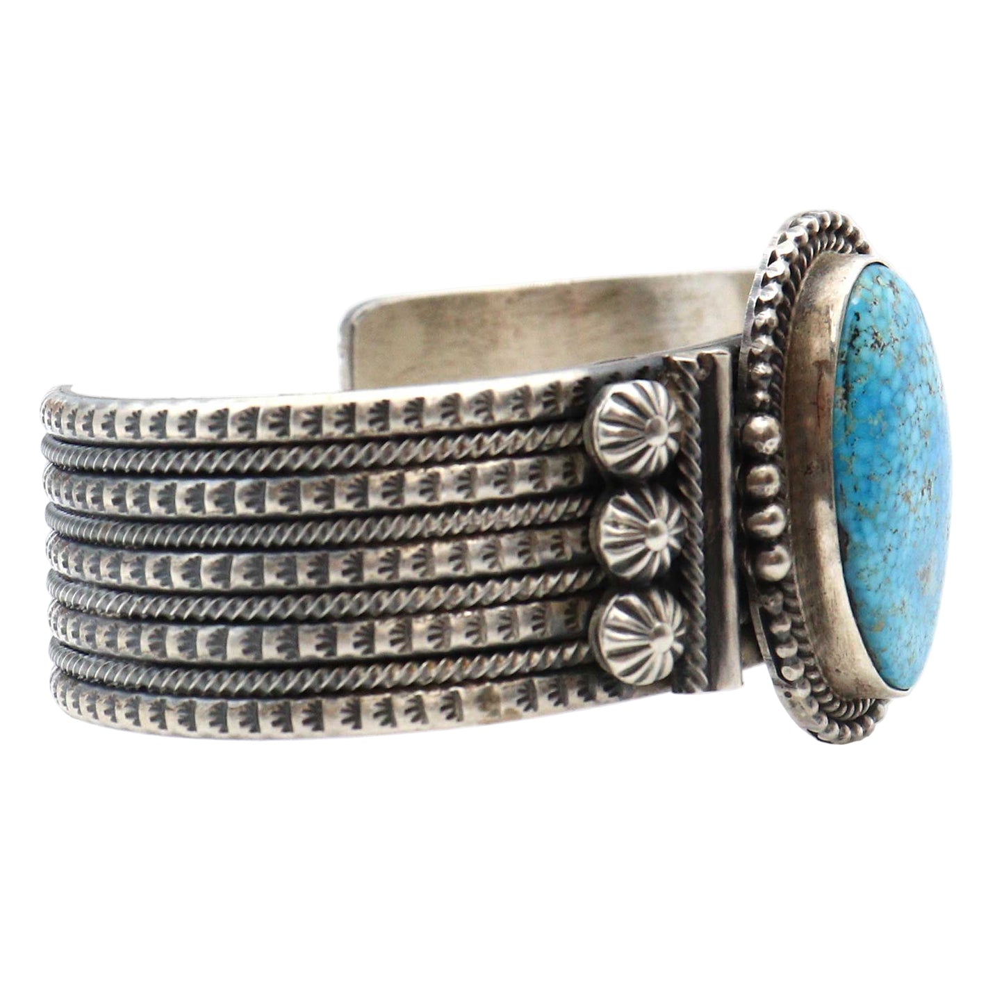 Silver bracelet with turquoise stone on a white background