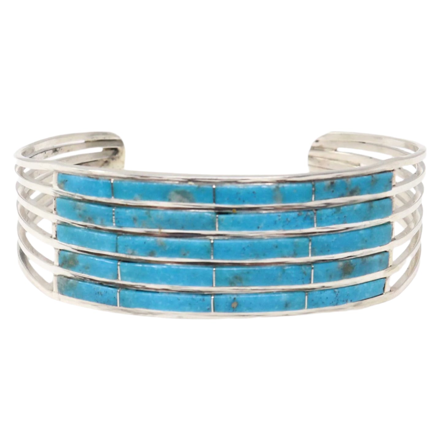 Silver bracelet with turquoise stones on a white background
