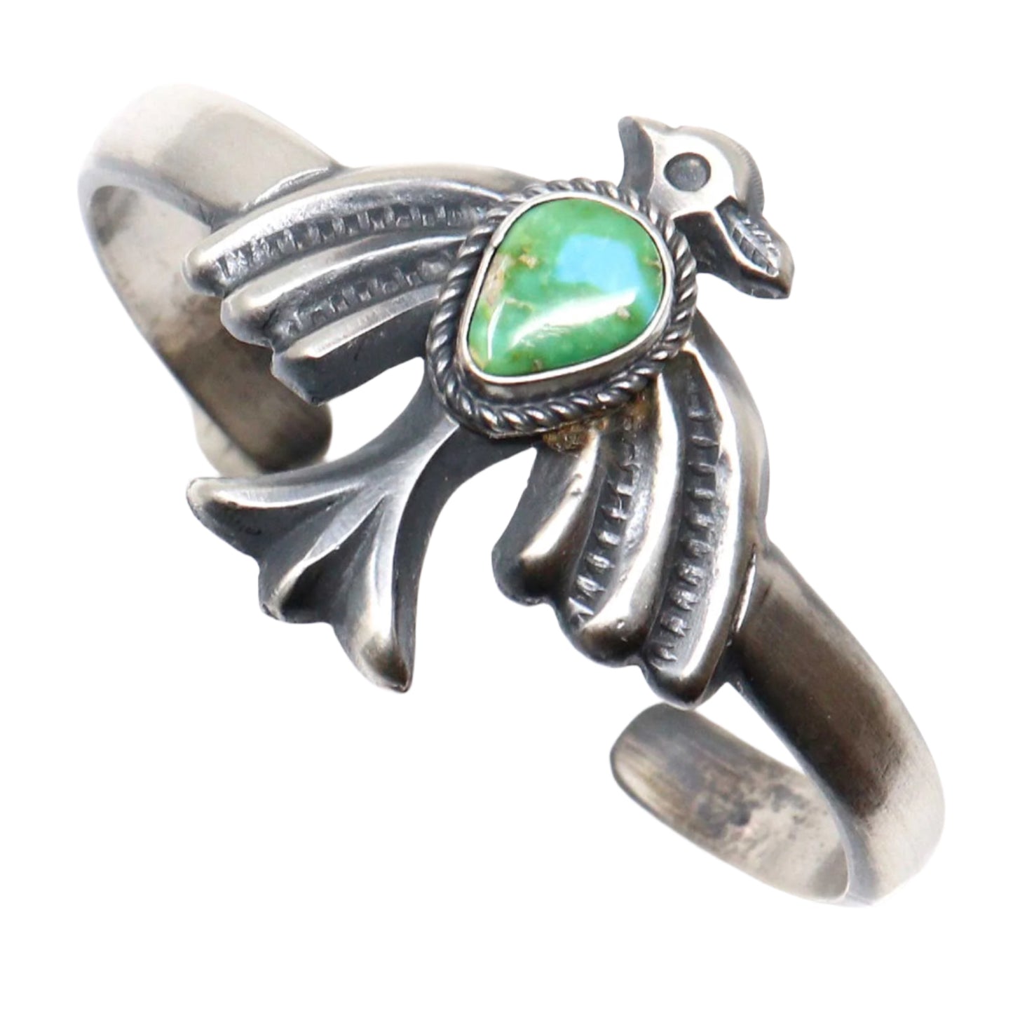 Sand cast silver bracelet with green turquoise stone