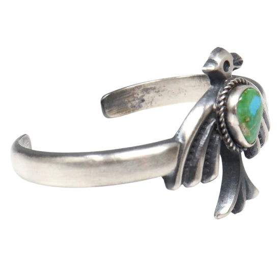 Sand cast silver bracelet with green turquoise stone by Bitsui