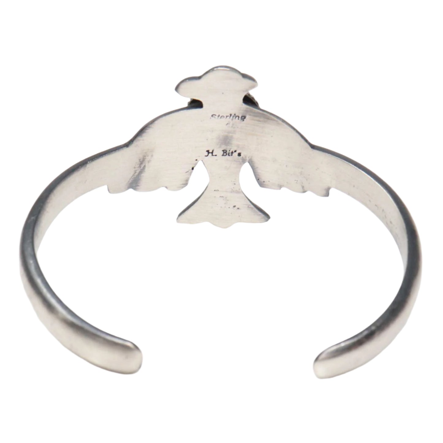 Sand cast silver bracelet with green turquoise stone by Bitsui