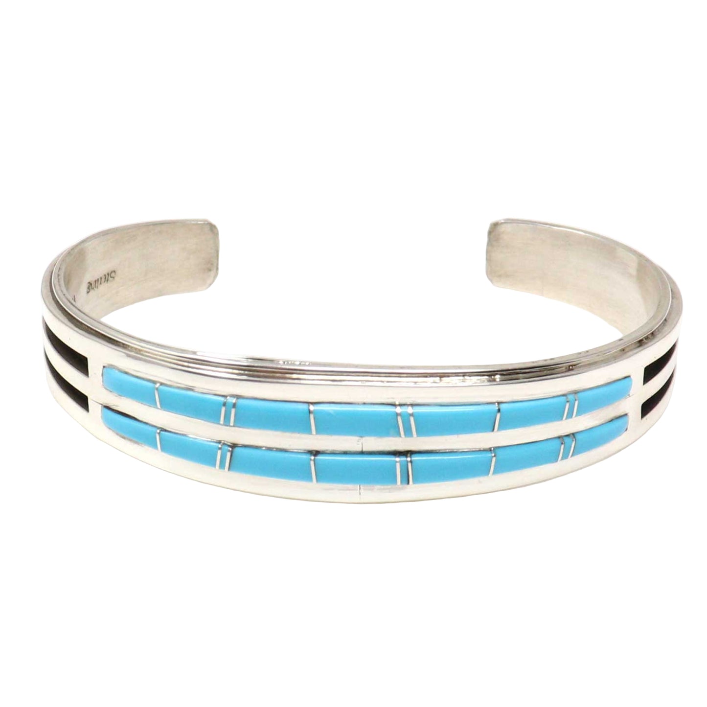 Silver bracelet with blue inlay on a white background