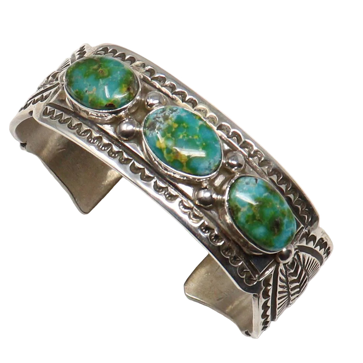 Silver bracelet with Sonoran Gold turquoise stones on a white background
