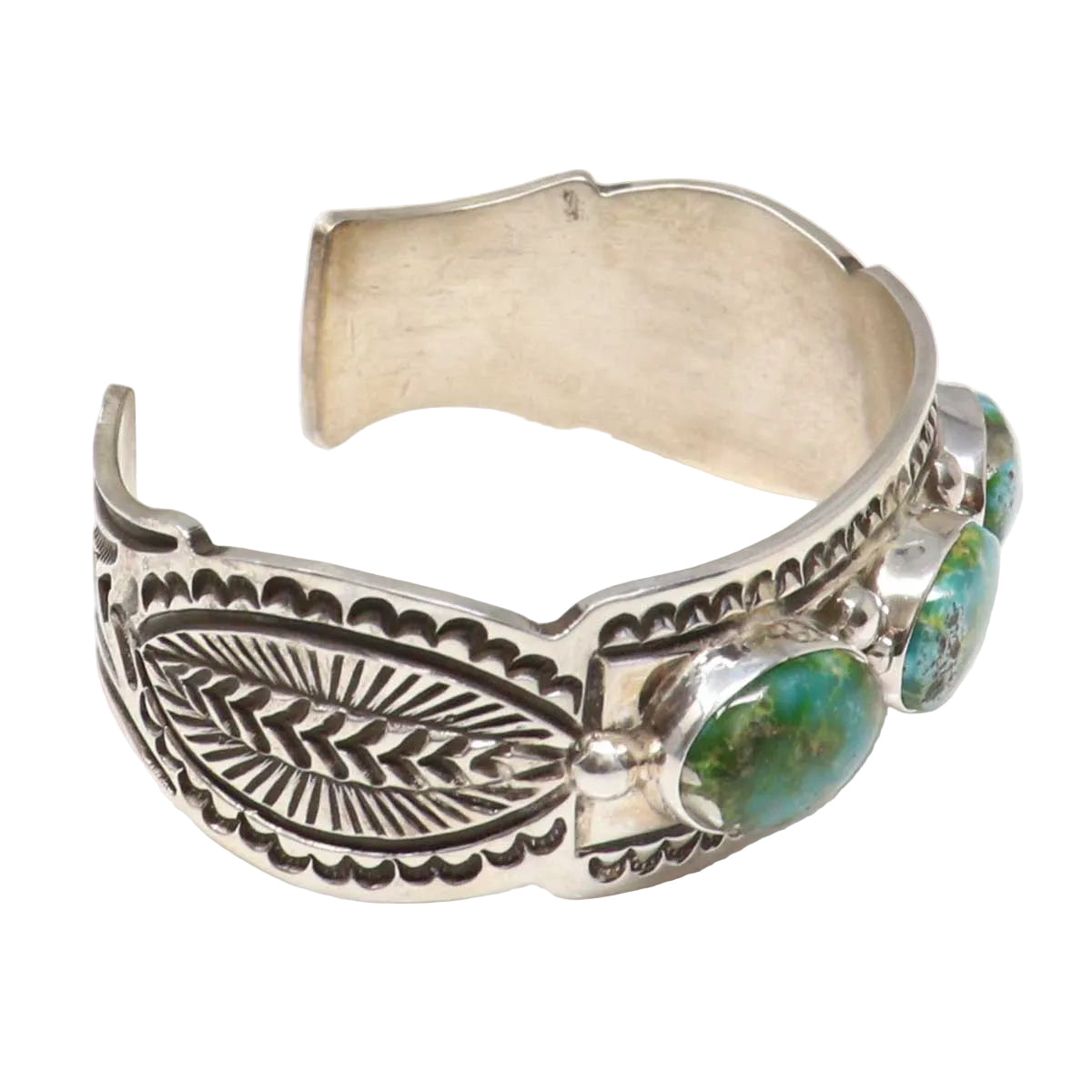 Silver bracelet with feather design and turquoise stones on a white background