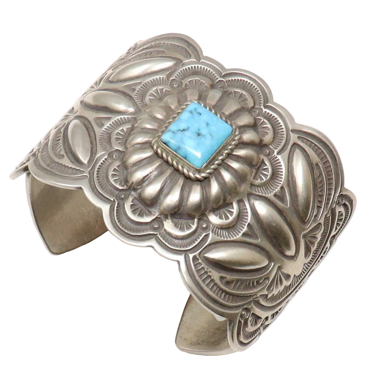 Silver bracelet with turquoise stone on a white background