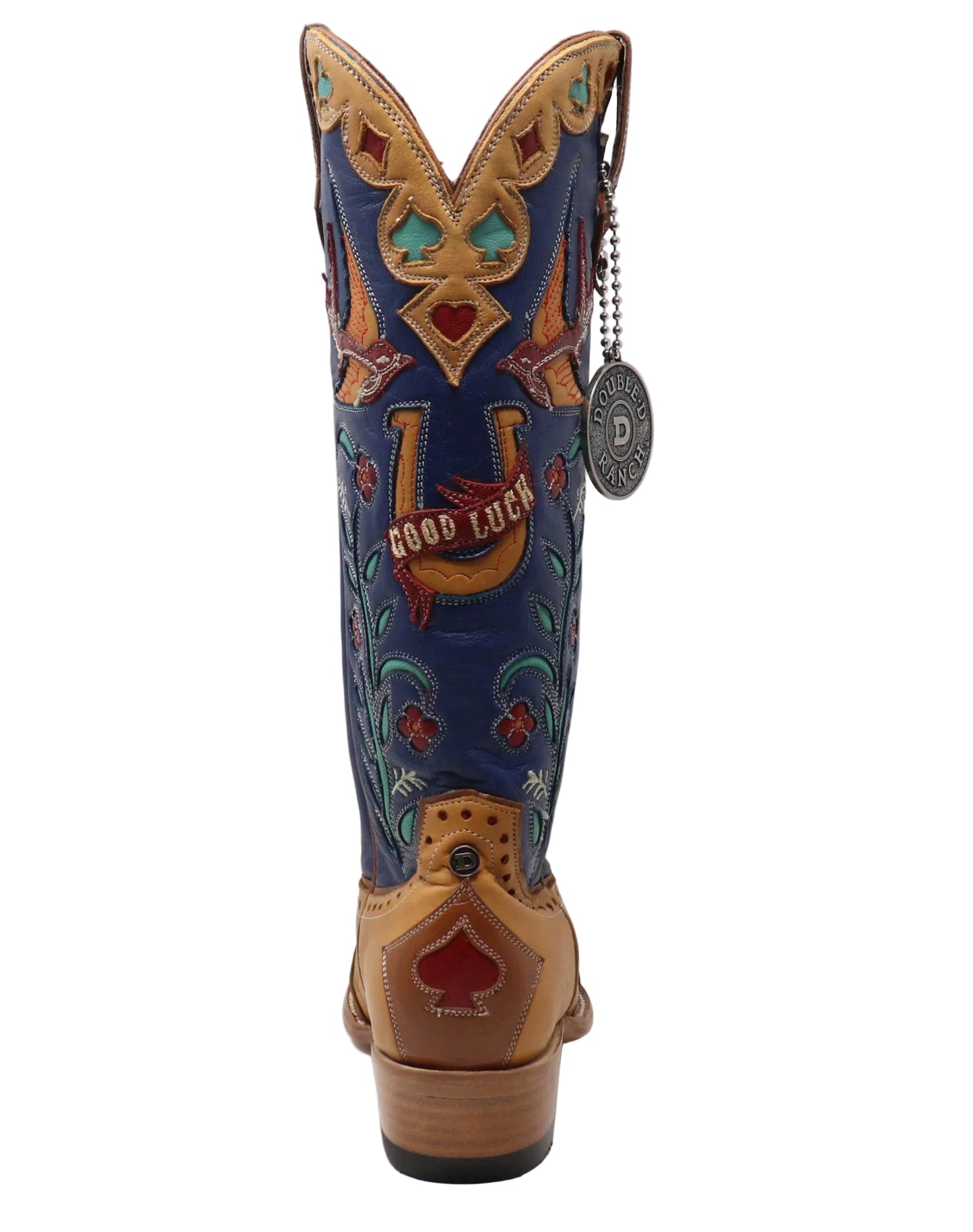 A single cowboy boot shown from the back on a white studio background. The shaft is dark blue with intricate multicolor floral and geometric tooling, including turquoise, red, and gold details, and the word 'GOOD LUCK' is stitched across the center.