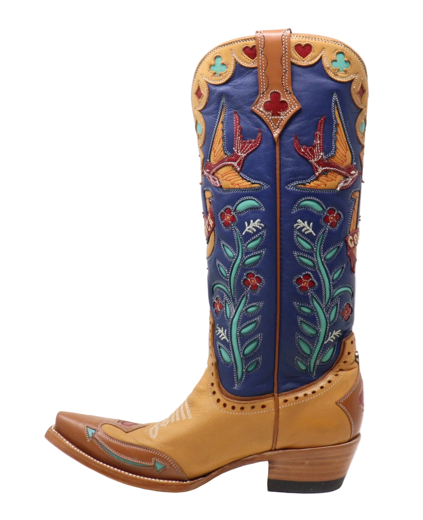 A single western cowboy boot shown in profile against a plain white studio background. The boot has a tan leather lower section and a dark blue shaft with colorful embroidered floral and bird motifs in red, green, and white.