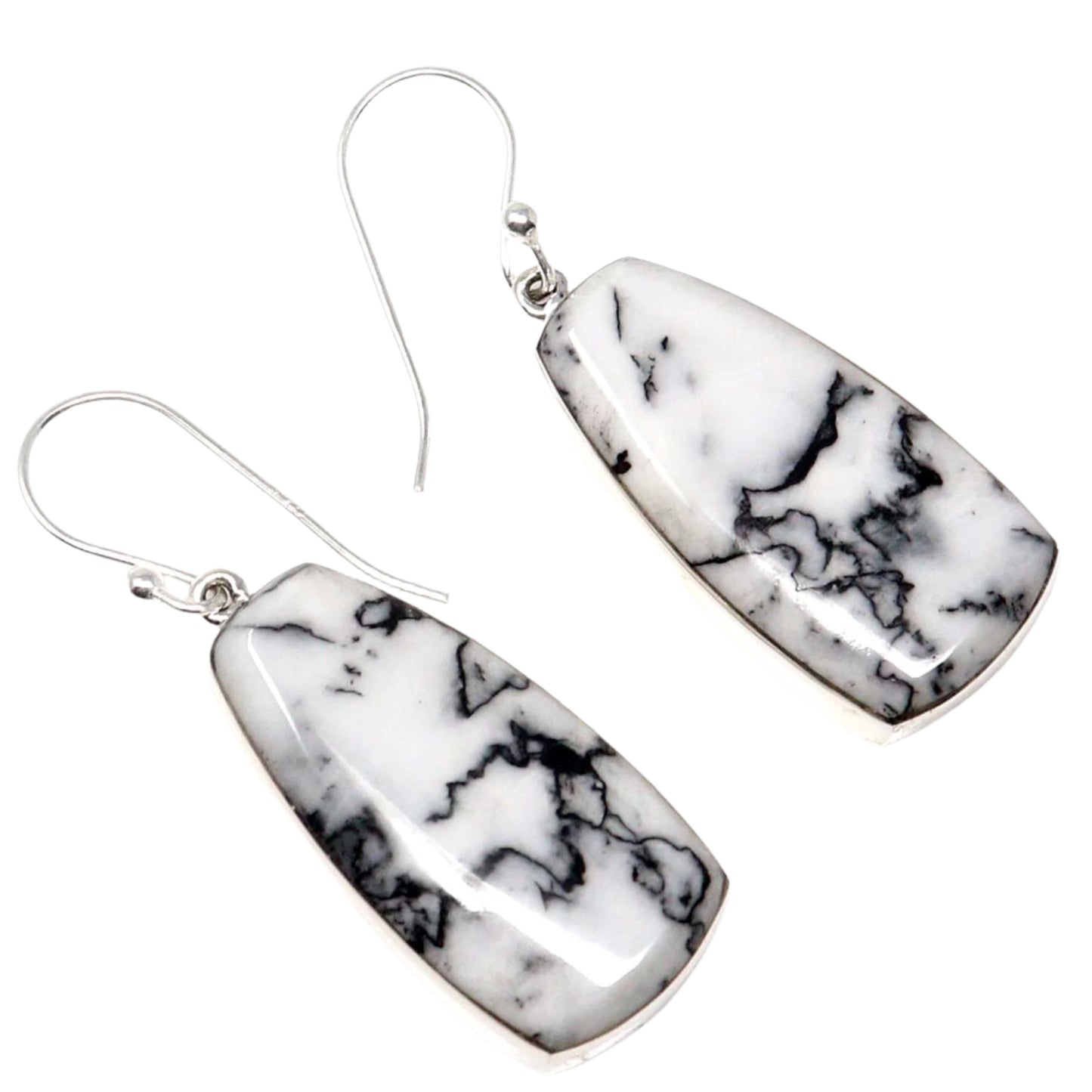 White Feather Jasper earrings on a white background
