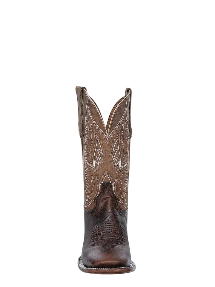 Brown cowboy boot with intricate design on a white background