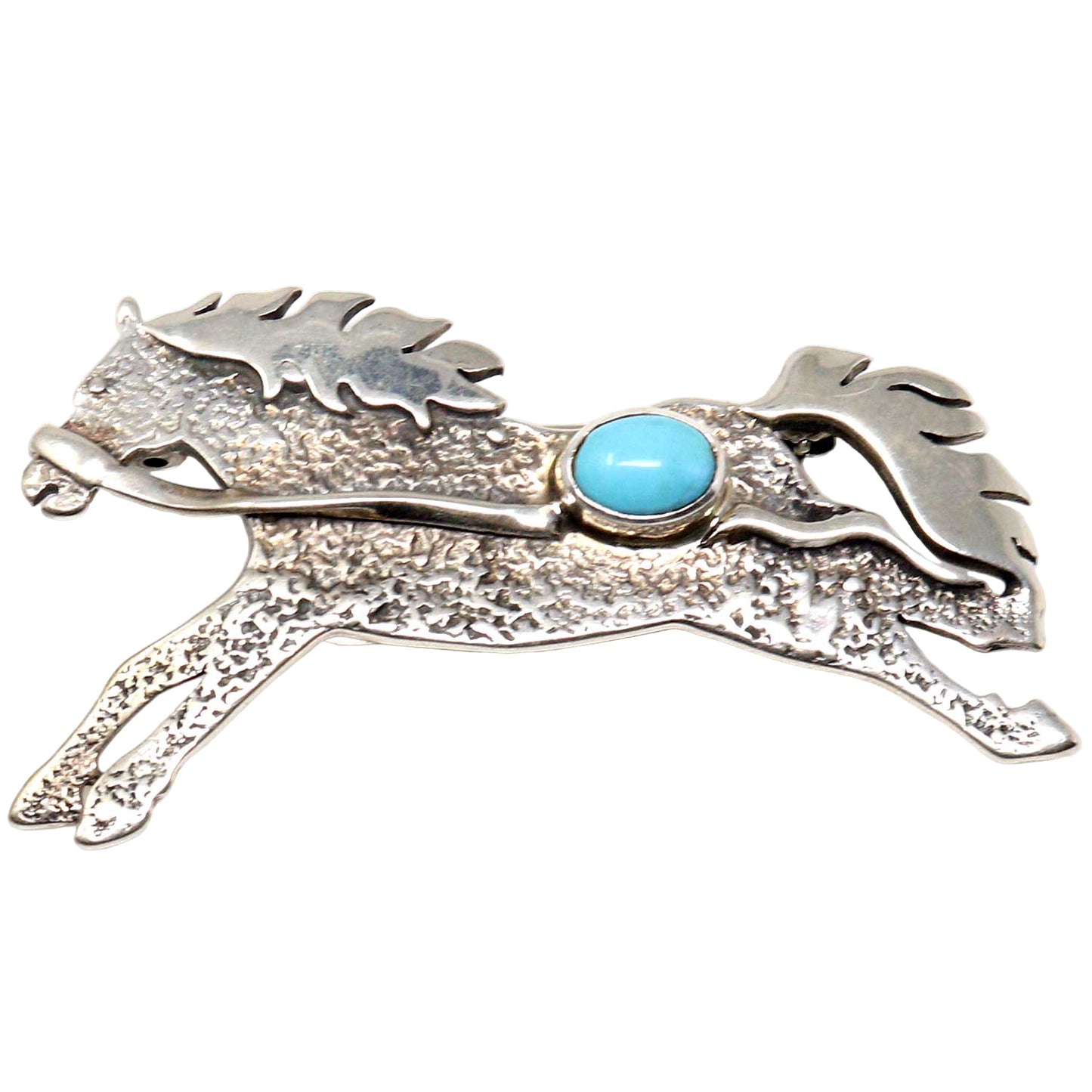 Silver pin with turquoise stone on a white background