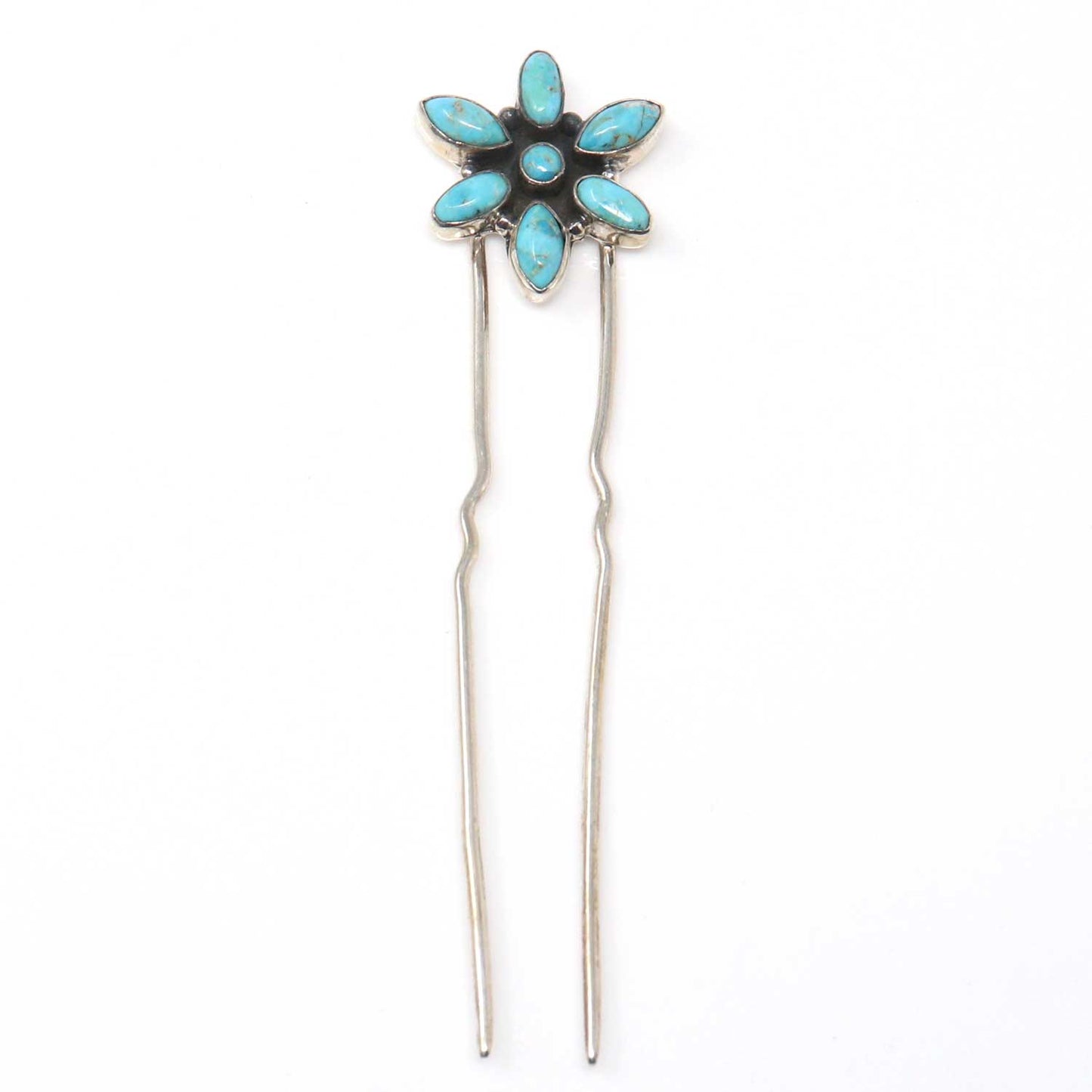 Silver hairpin with turquoise flower design on a white background