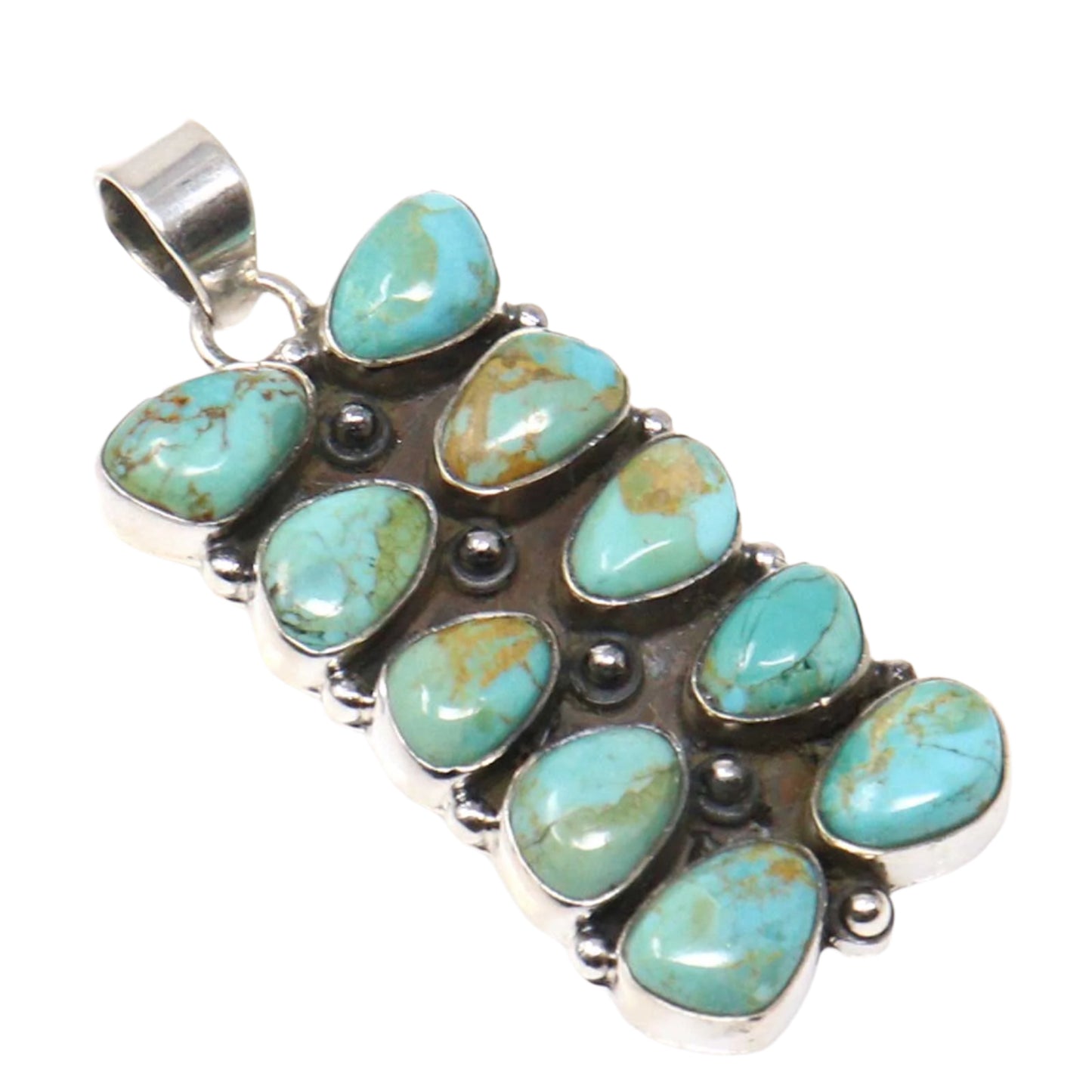 Turquoise stone pendant with silver setting on a white background
