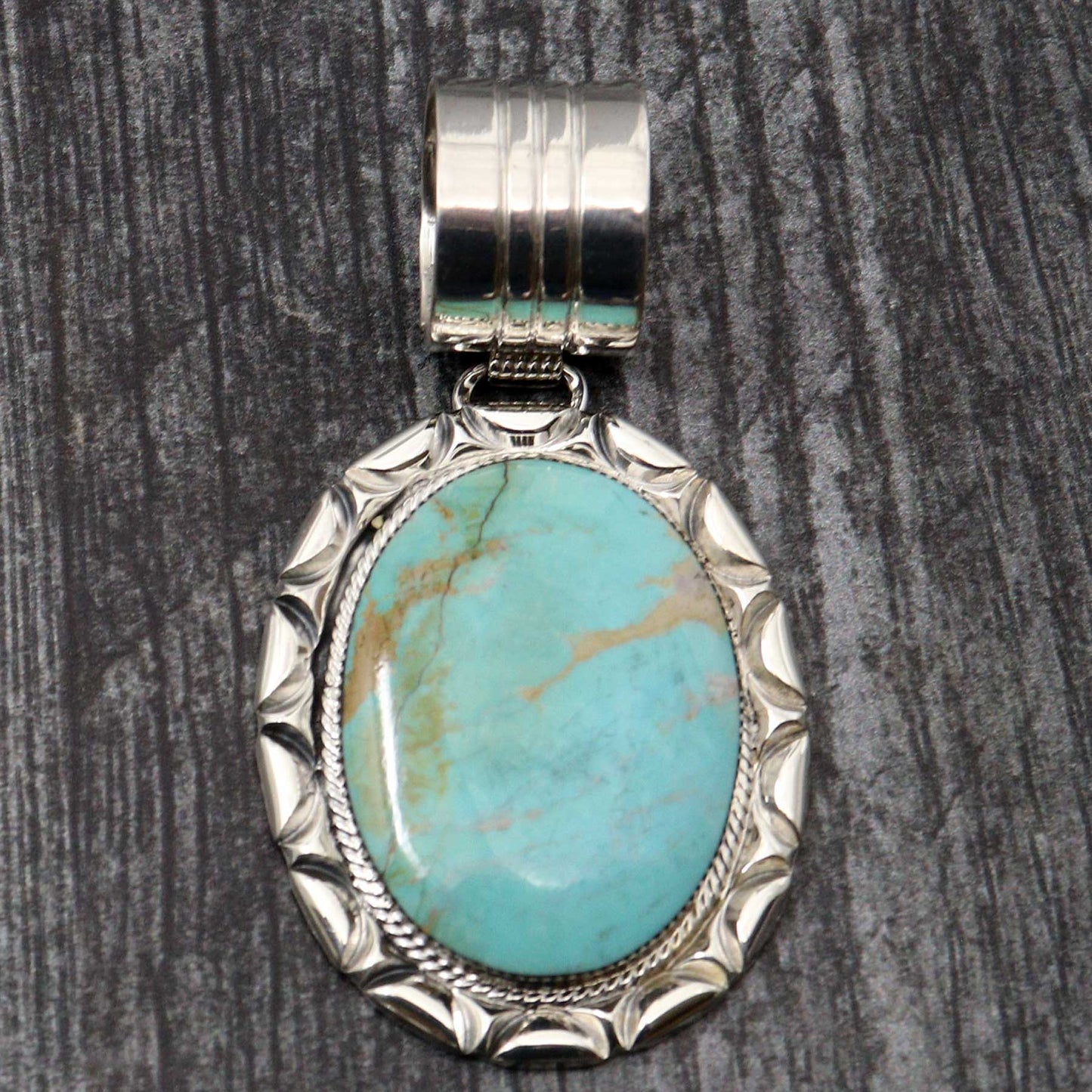 Crow Springs Turquoise Pendant by Gregg Yazzie
