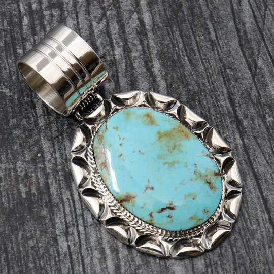 Crow Springs Turquoise Silver Pendant by Gregg Yazzie