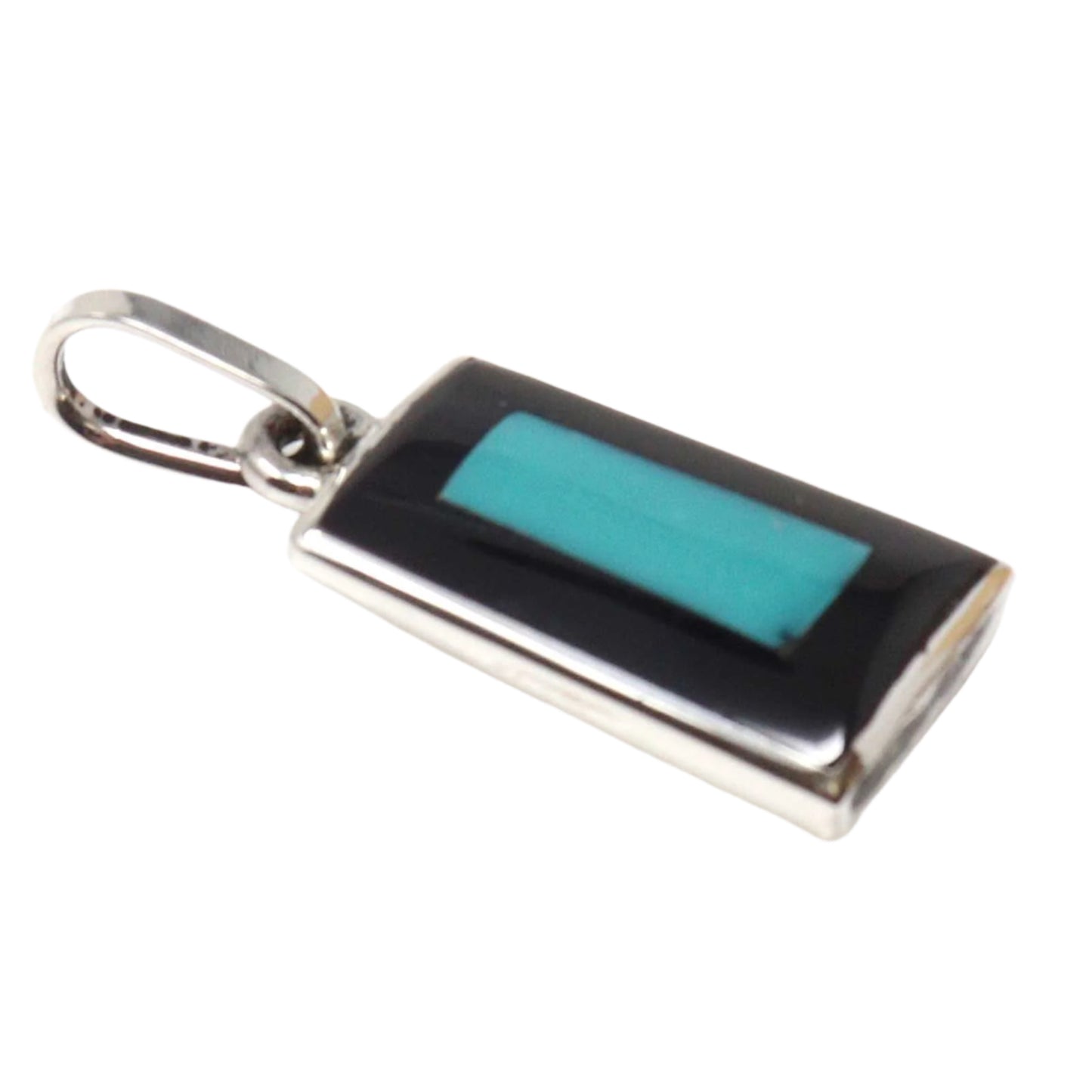 Silver pendant with a turquoise stone on a white background