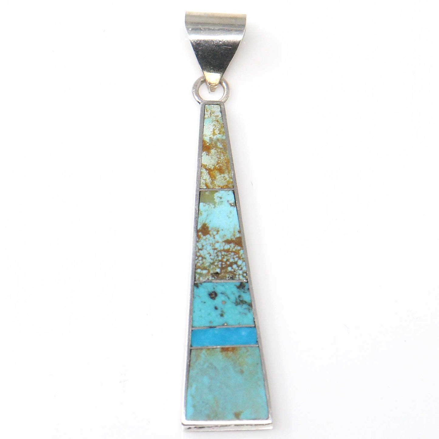 Turquoise pendant with silver setting on a white background