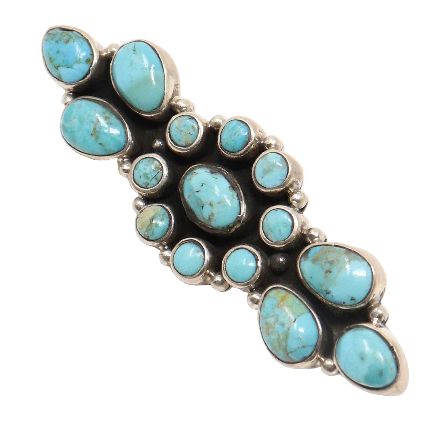 Turquoise stone and silver jewelry on a white background
