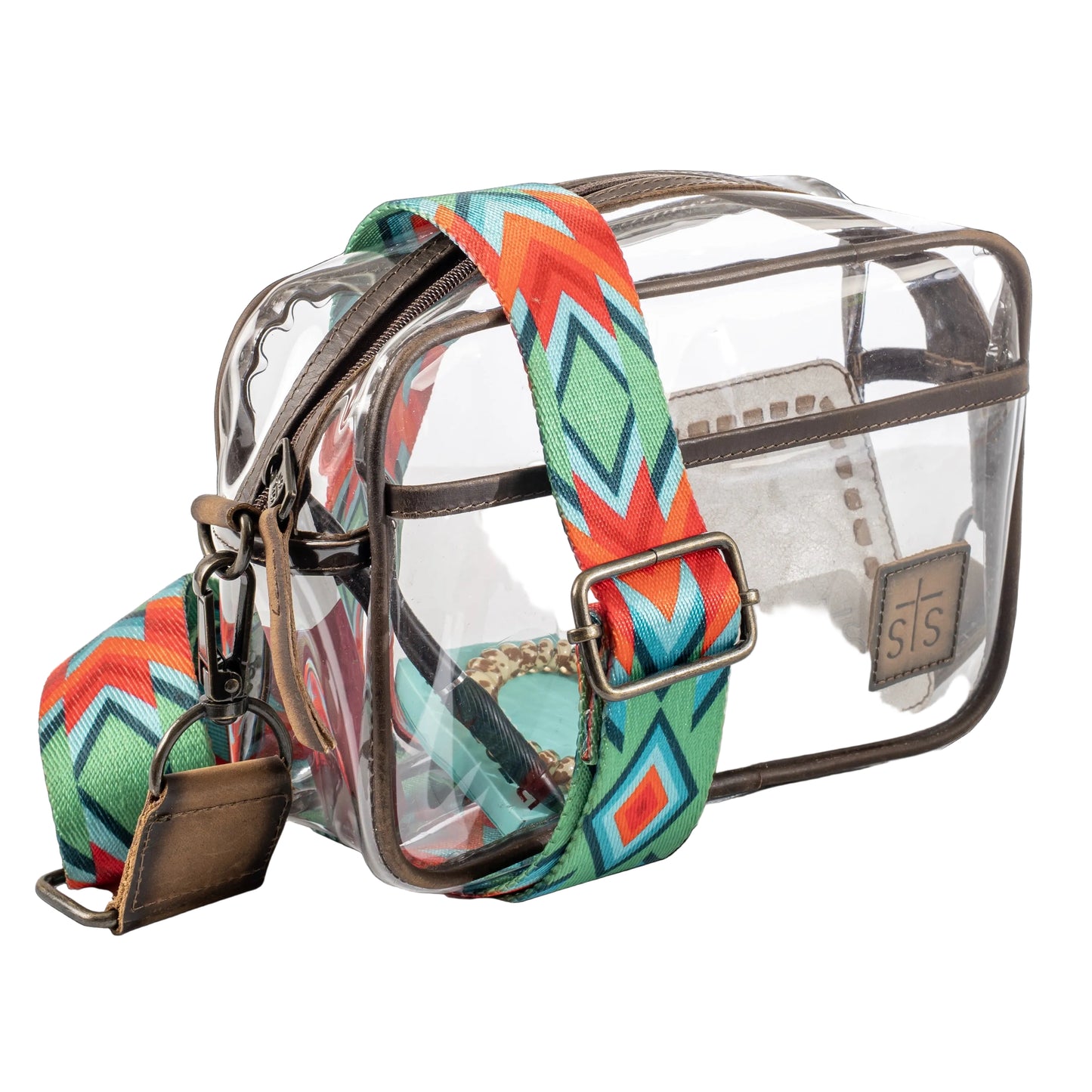 Clear bag with a colorful strap featuring geometric patterns on a black background