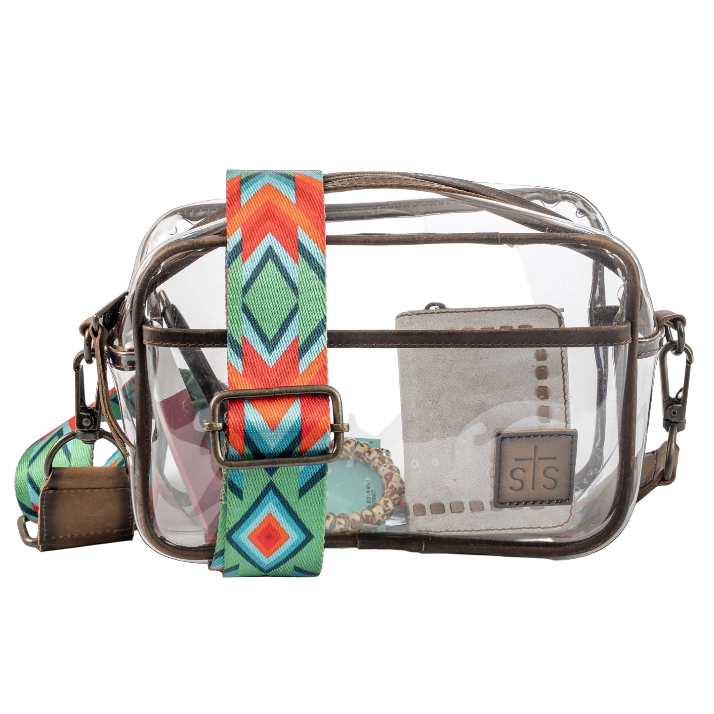 Clear bag with colorful strap and visible brand logo on a white background