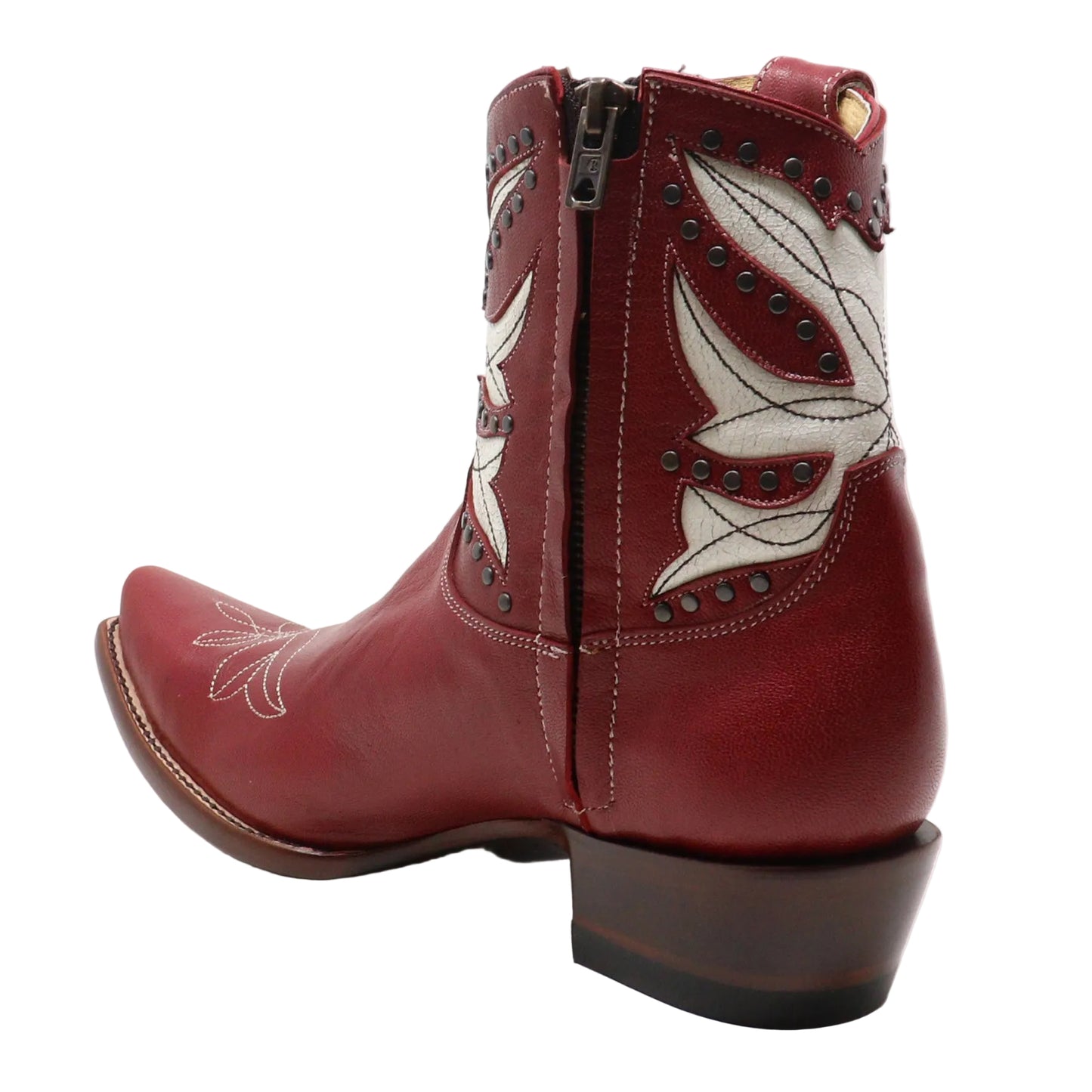 A red leather cowboy boot with white embroidered western detailing and dark brown stacked heels, shown from a side-rear angle on a white studio background.