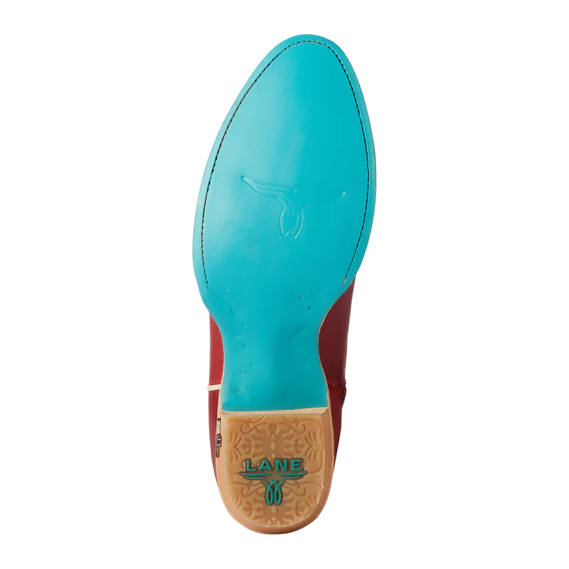 Close-up of a shoe sole with a visible brand logo on a white background