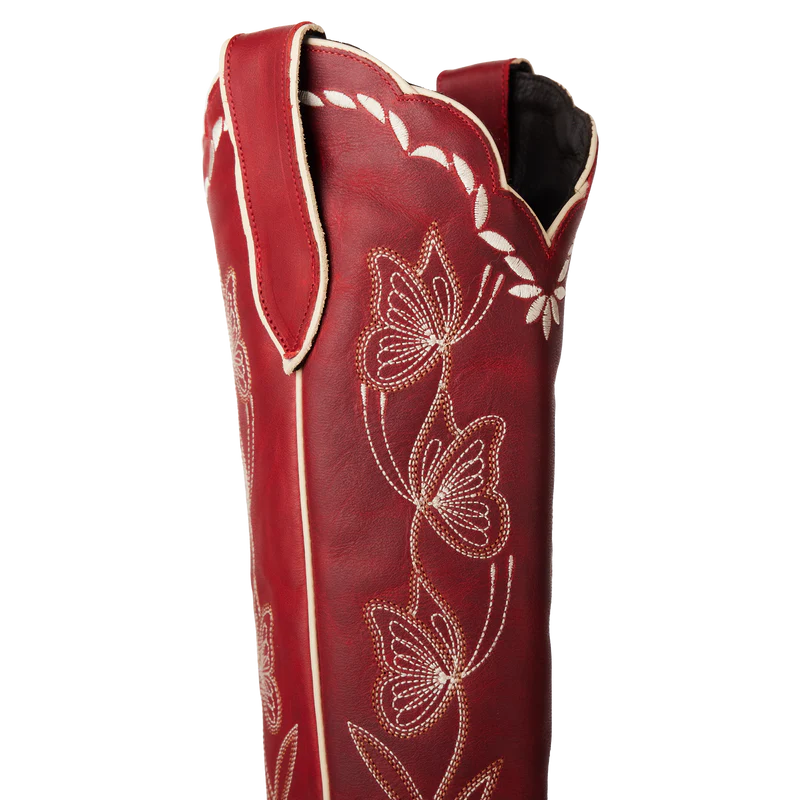 Red leather boot with white embroidery on a white background