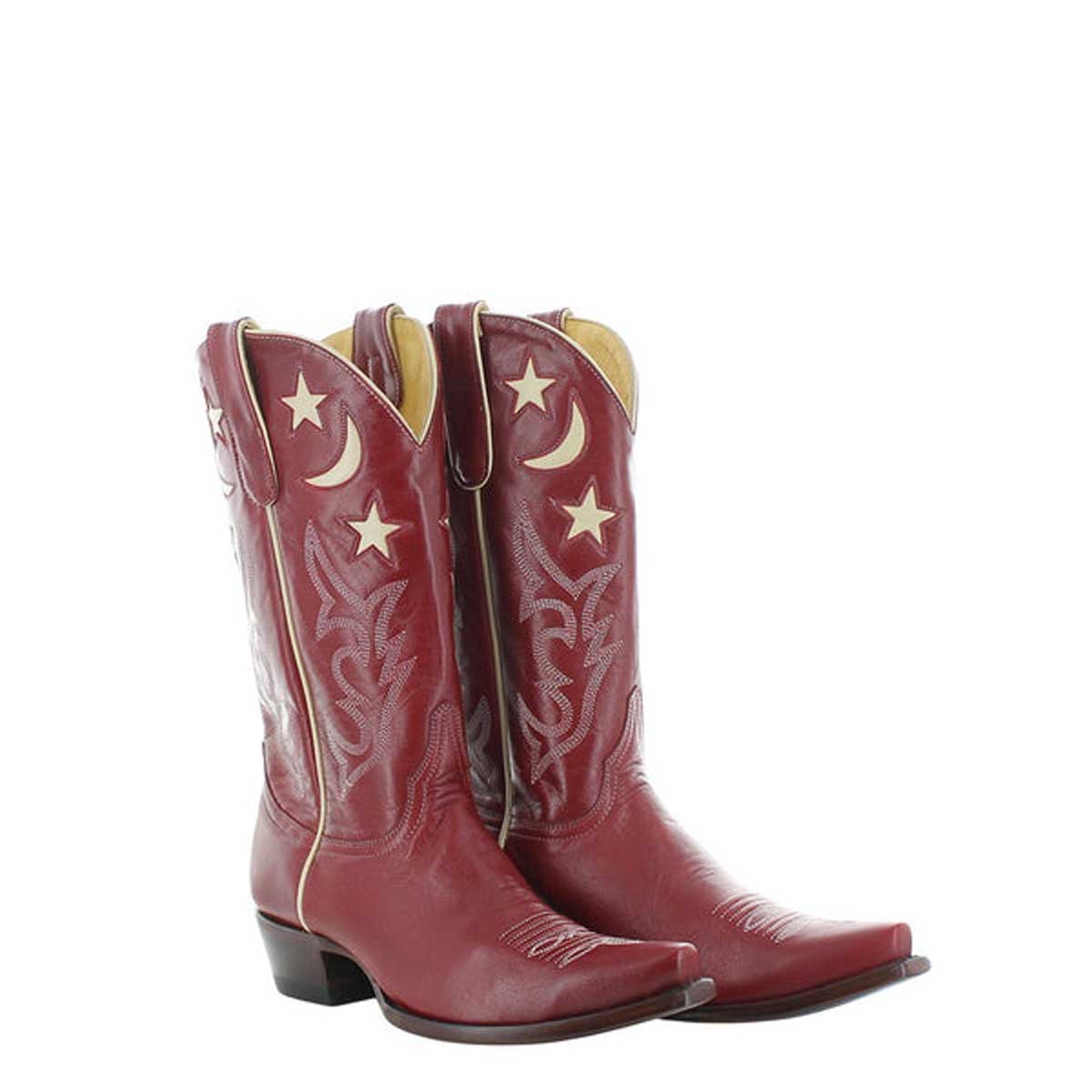 Red cowboy boots with white star and moon designs on a white background