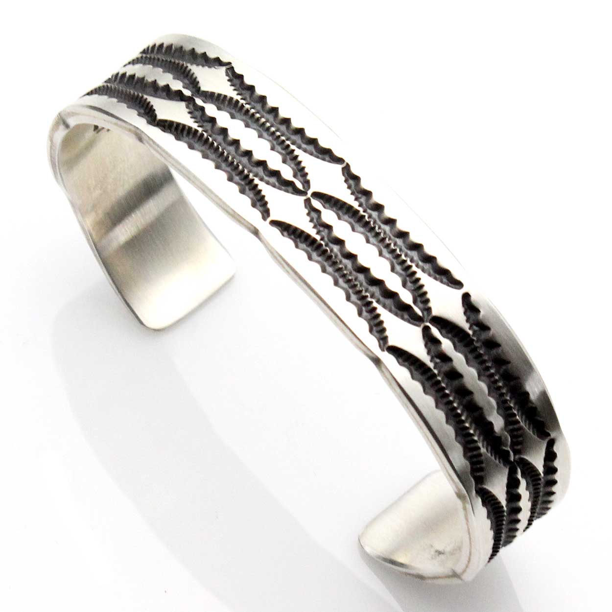Load image into Gallery viewer, Heavy Stamped Silver Bracelet by Tahe
